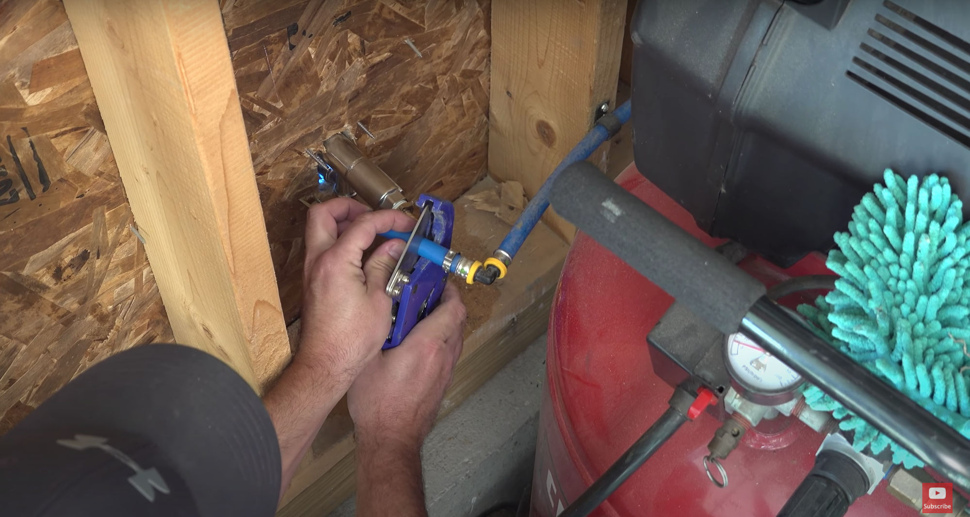 Cutting the PEX to fit.