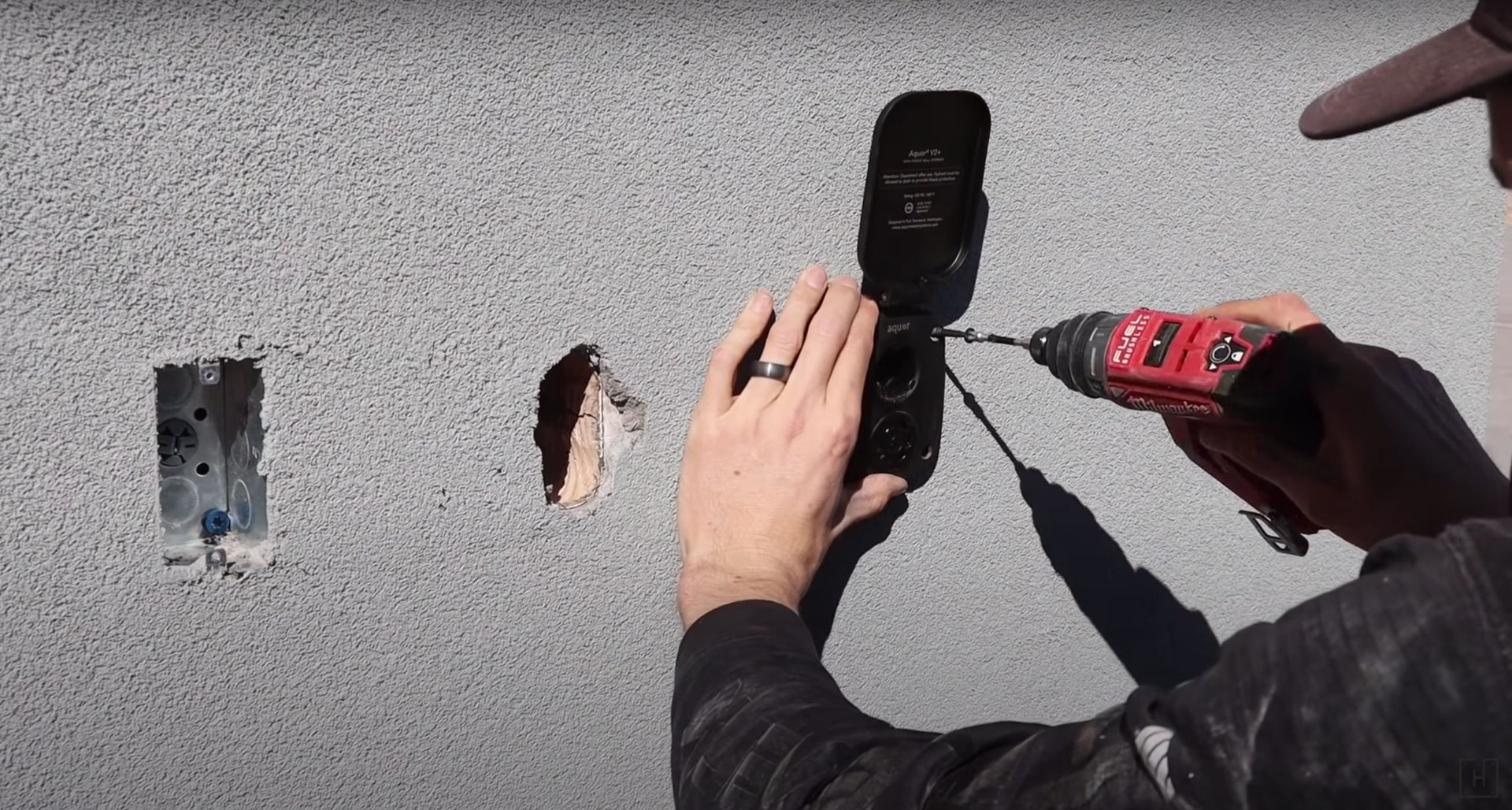 Drilling the screws into place.