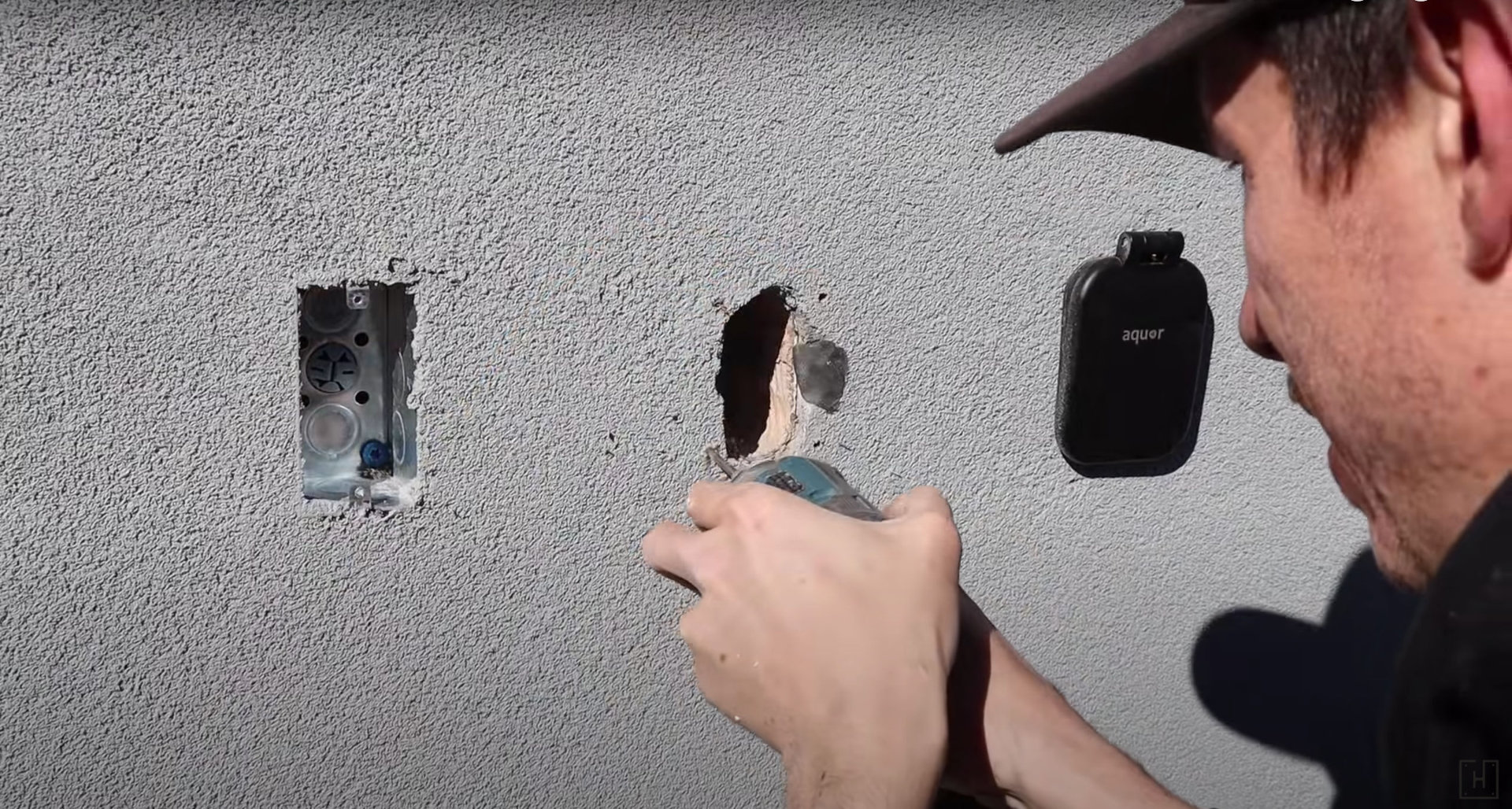 Further enlarging the holes for the screws.