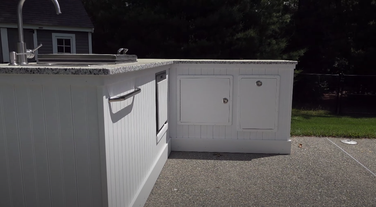 Outdoor kitchen unit with a sink.