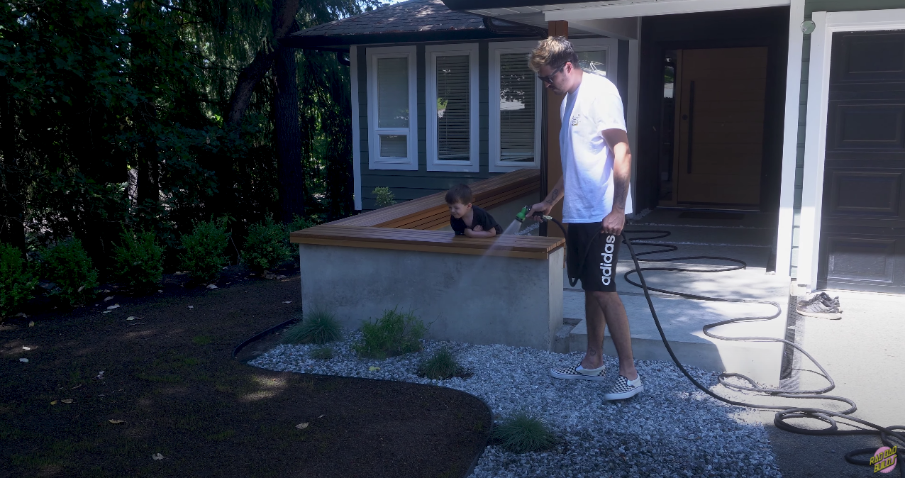Nick and a son are a fan of their sleek new outdoor water system.