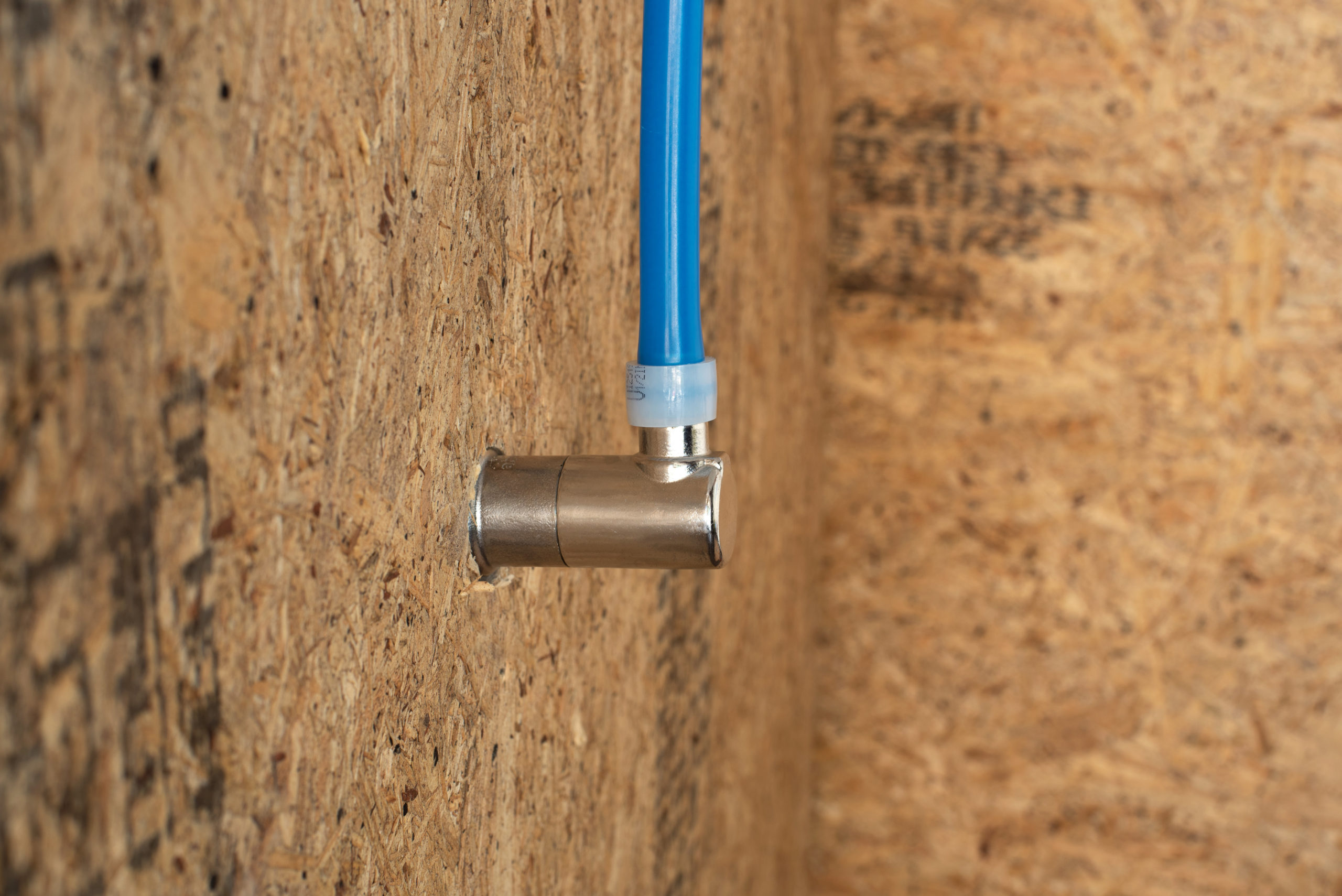 PEX Elbow Inlet connected to PEX tubing