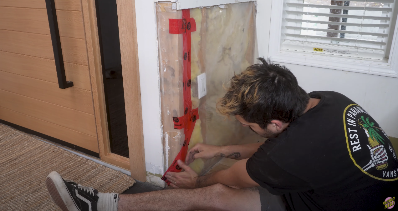 Sealing up the moisture barrier.