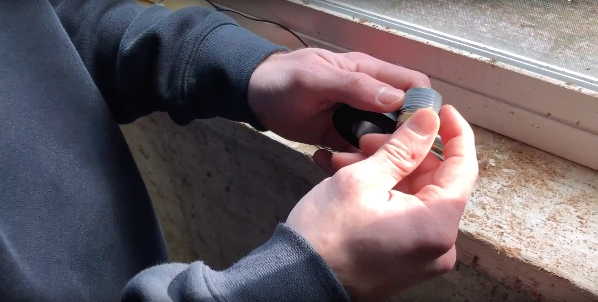 Wrap teflon tape around the 1/2-inch NPT fitting